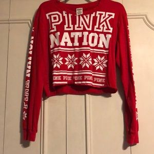 Pink crop top and matching leggings.